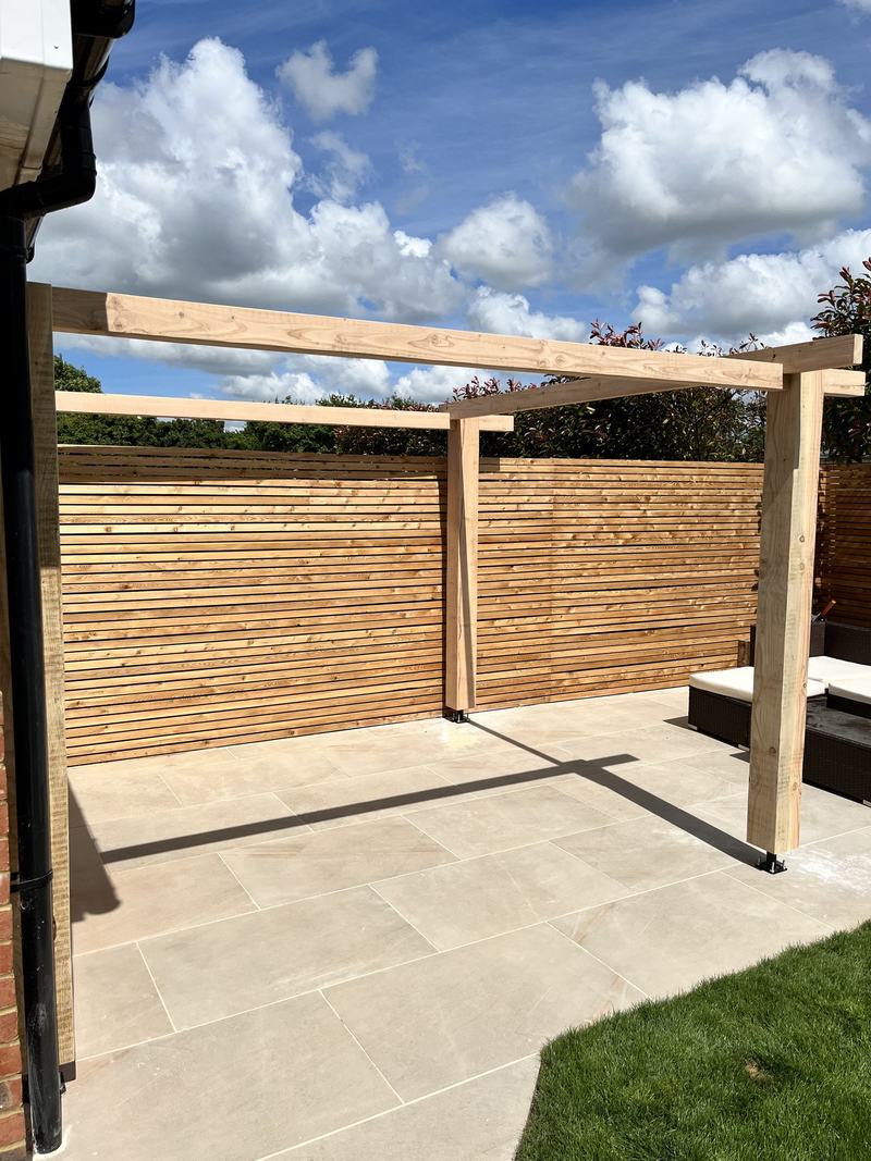 Before finishing: The pergola complete in natural timber, before it was finished black.