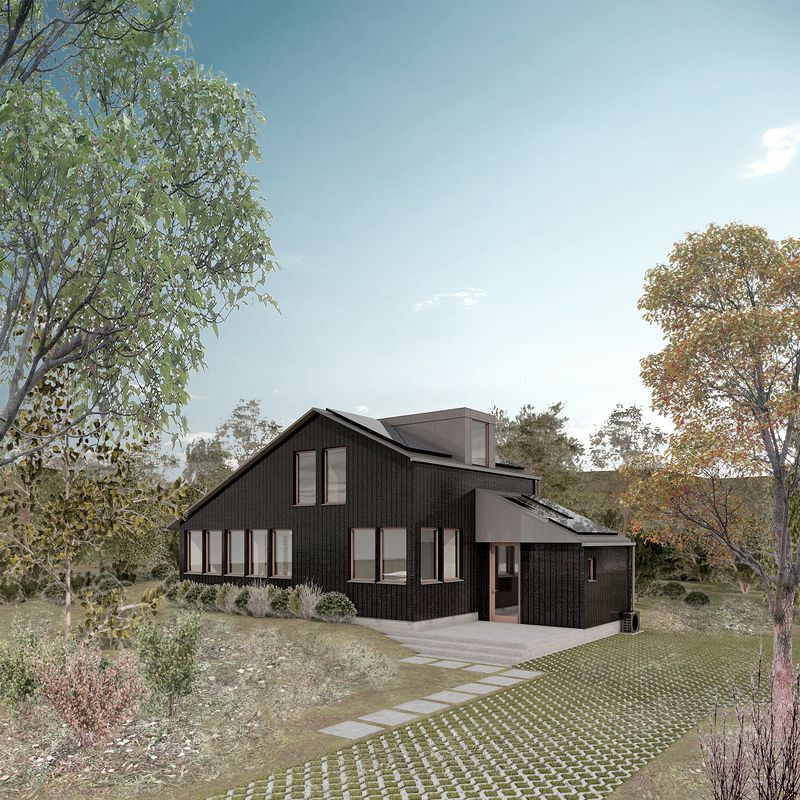 Concept visual of a Kanso home: a dark timber-clad house with a steep pitched roof and large windows, set among trees