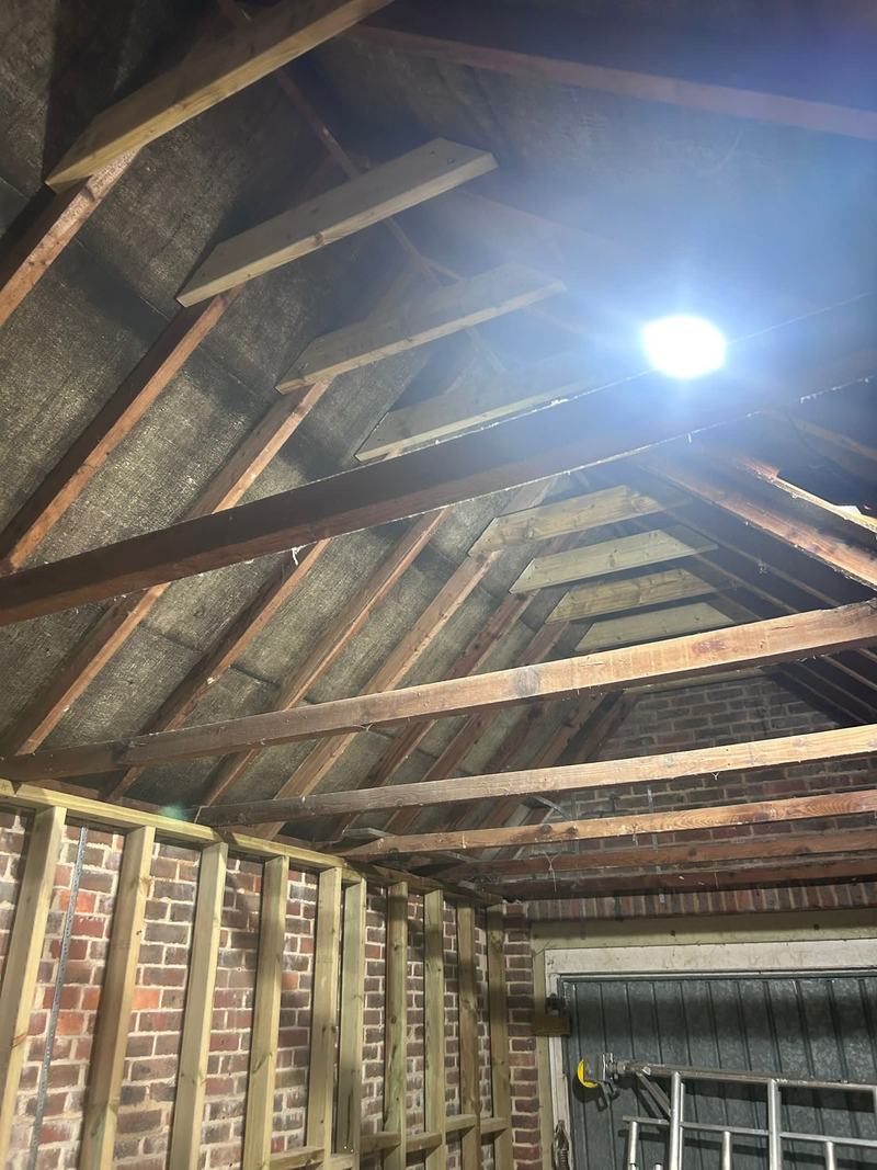 Strip-out: The original roof and walls exposed.
